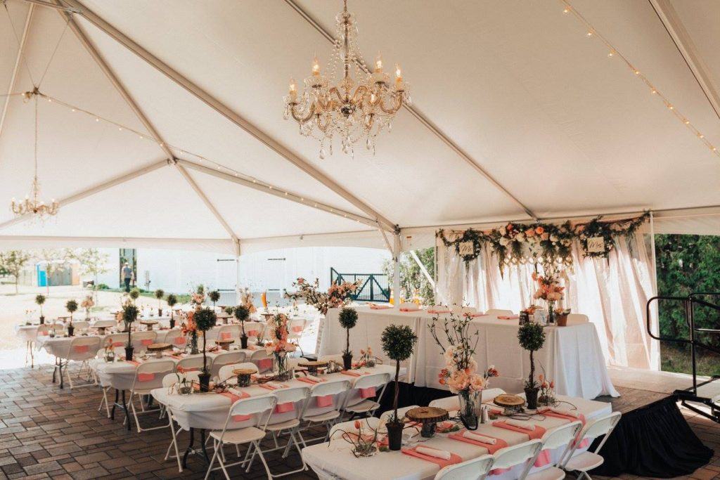 Ceremony space set up under event tent